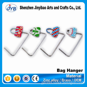 wholesale cheap metal restaurant unfoldable bag hanger on table top
